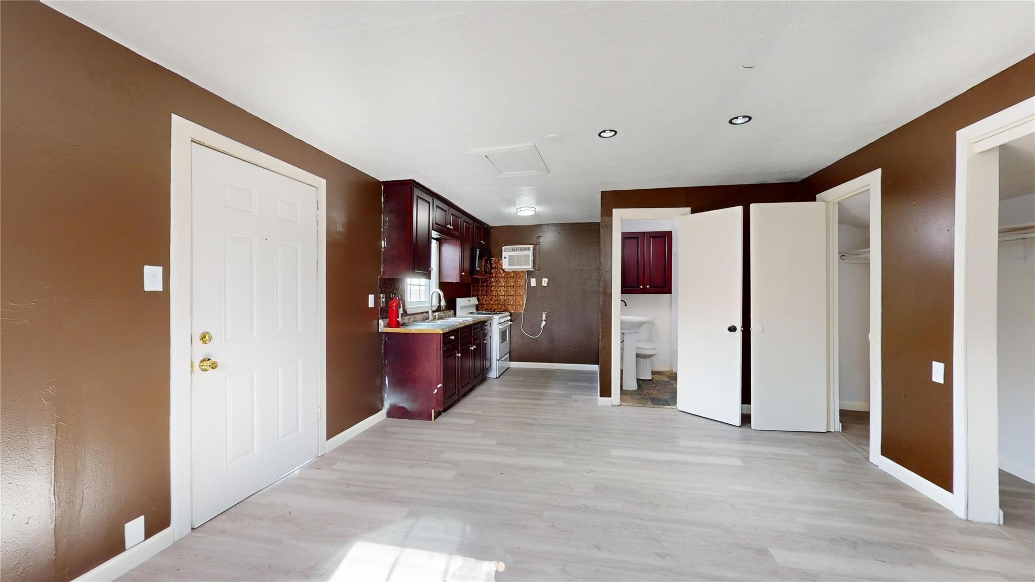 3806 Cosby Street Houston, TX 77021 - Photo 42 of 48 a view of a hallway with wooden shelves