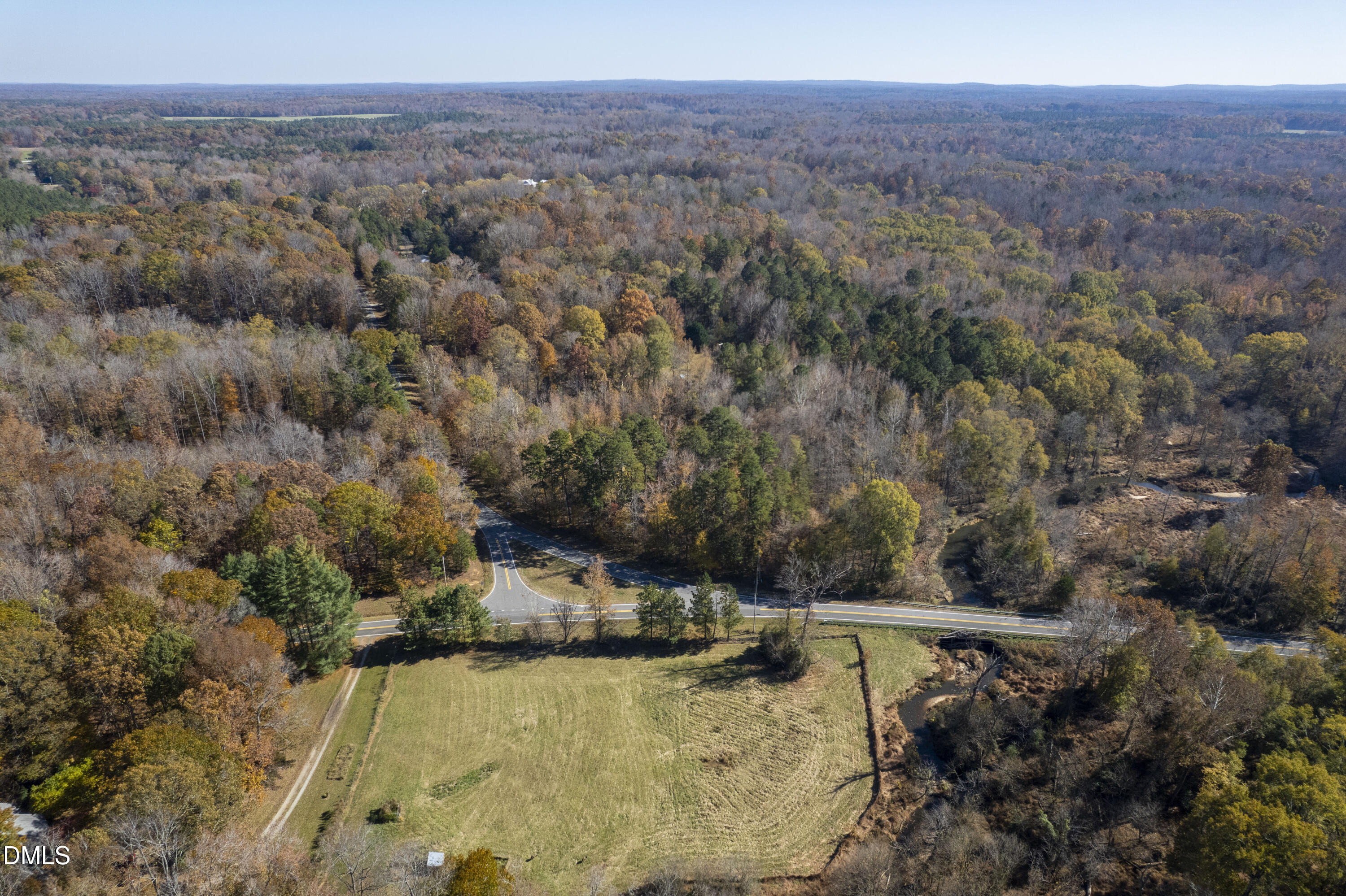 1-3 Walnut Grove Hurdle Mills, NC 27541 - Photo 22 of 40 a view of a yard with a forest