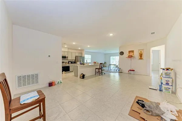 a living room with furniture and a table