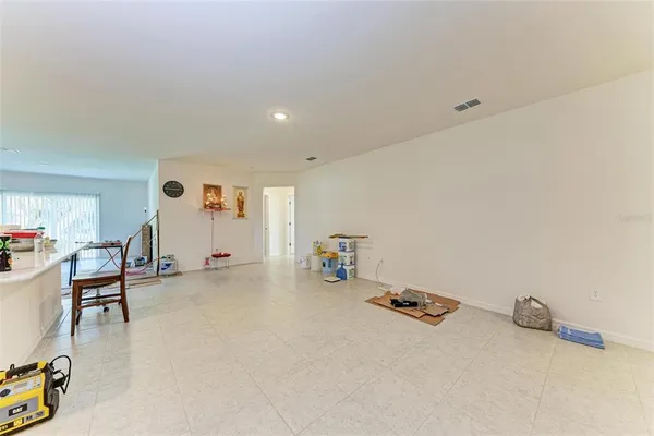 a room with furniture and gym equipment