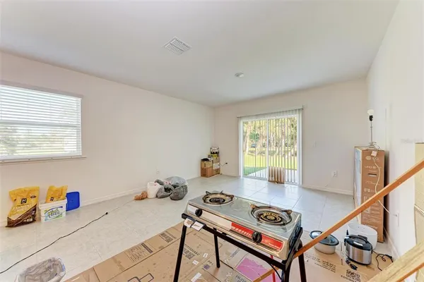 a room with furniture and a flat screen tv