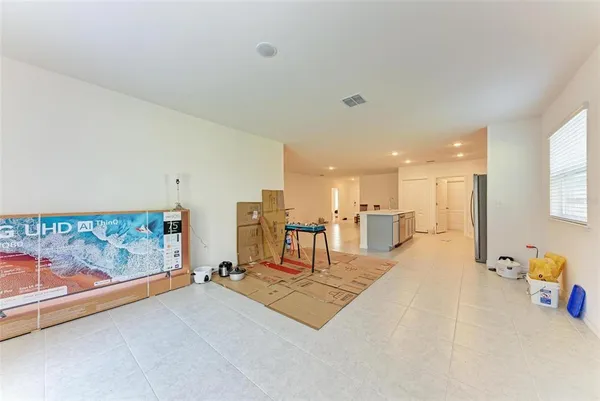 a view of a living room and dining room
