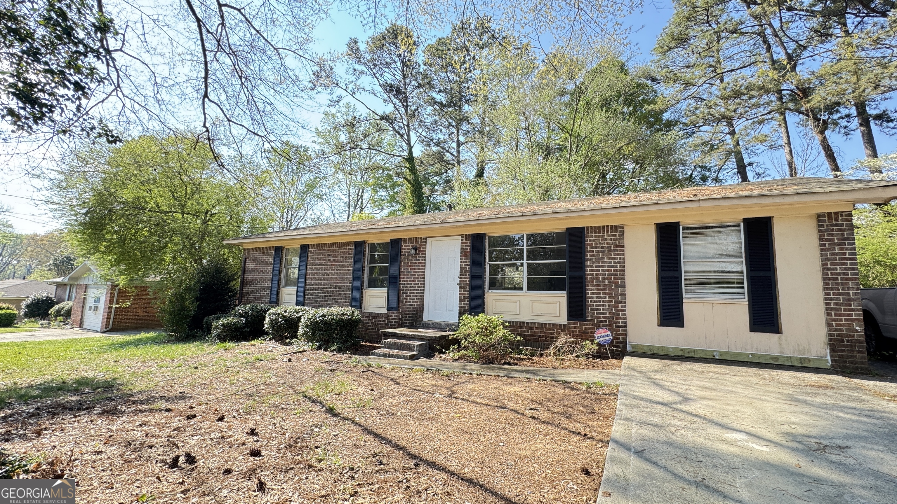 723 Sheffield Road Norcross, GA 30071 - Photo 1 of 8 a front view of a house with garden and plants