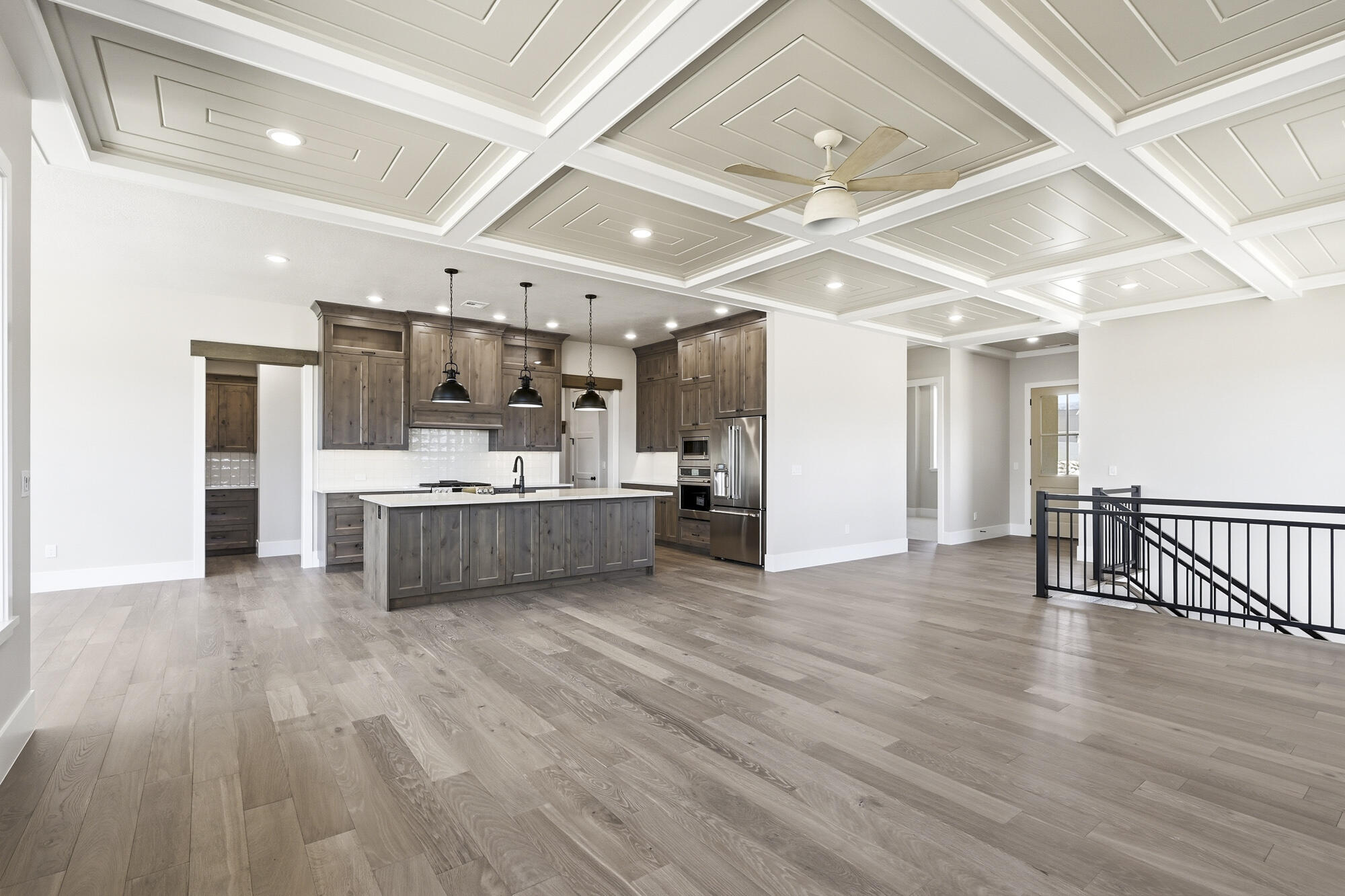 1852 South Hidden Canyon Road Cedar City, UT 84720 - Photo 11 of 79 The open-concept living/kitchen/dining offers a spacious feel, perfect for everyday living as well as entertaining.