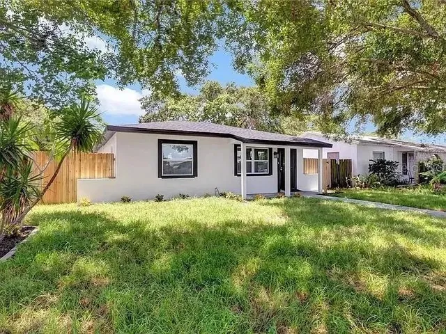 a house view with a garden space