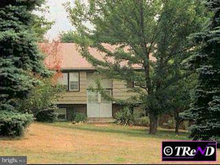 Macbride Dr Spring Spring City, PA 19475 - Photo 1 of 1 a front view of a house with garden