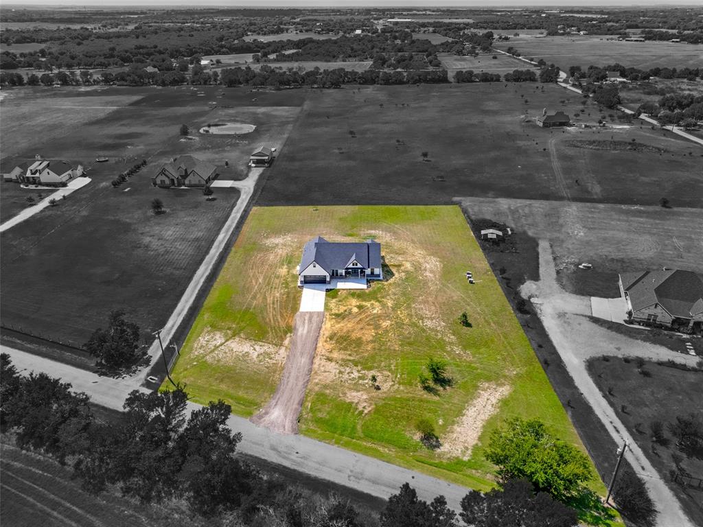 3150 Crisp Road Ennis, TX 75119 - Photo 27 of 30 Contemporary residence situated on a spacious, verdant lot