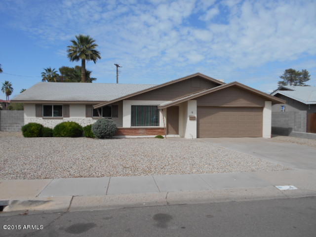 4 East Del Rio Drive Tempe, AZ 85282 - Photo 1 of 22 a front view of a house with a yard and garage
