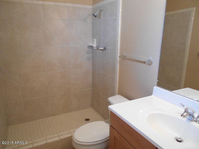 4 East Del Rio Drive Tempe, AZ 85282 - Photo 14 of 22 a bathroom with a sink a toilet and shower