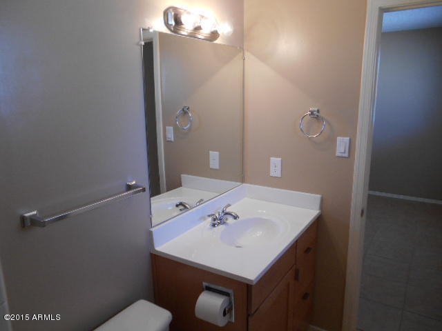 4 East Del Rio Drive Tempe, AZ 85282 - Photo 15 of 22 a bathroom with a sink a toilet and shower