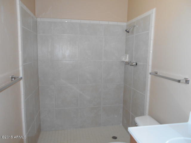 4 East Del Rio Drive Tempe, AZ 85282 - Photo 16 of 22 a bathroom with a shower and a toilet
