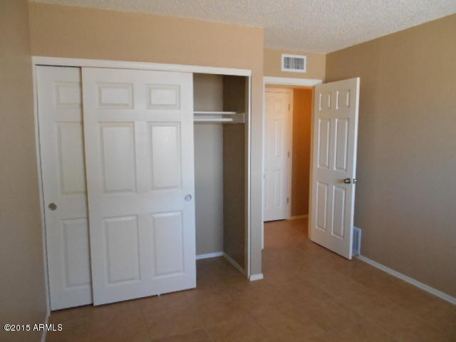 4 East Del Rio Drive Tempe, AZ 85282 - Photo 18 of 22 a view of an empty room with closet area