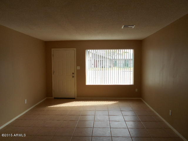 4 East Del Rio Drive Tempe, AZ 85282 - Photo 2 of 22 a view of an empty room with a window