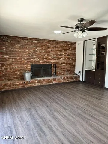 a view of a livingroom with wooden floor