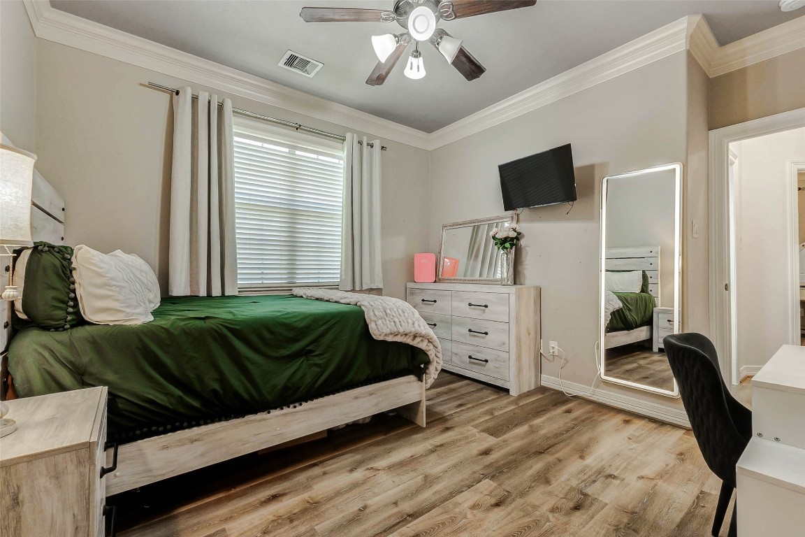 4403 Wickby Street Fulshear, TX 77441 - Photo 32 of 50 Plenty of room for this queen sized bed. The wall is already set up to install a TV for unwinding at the end of the day.