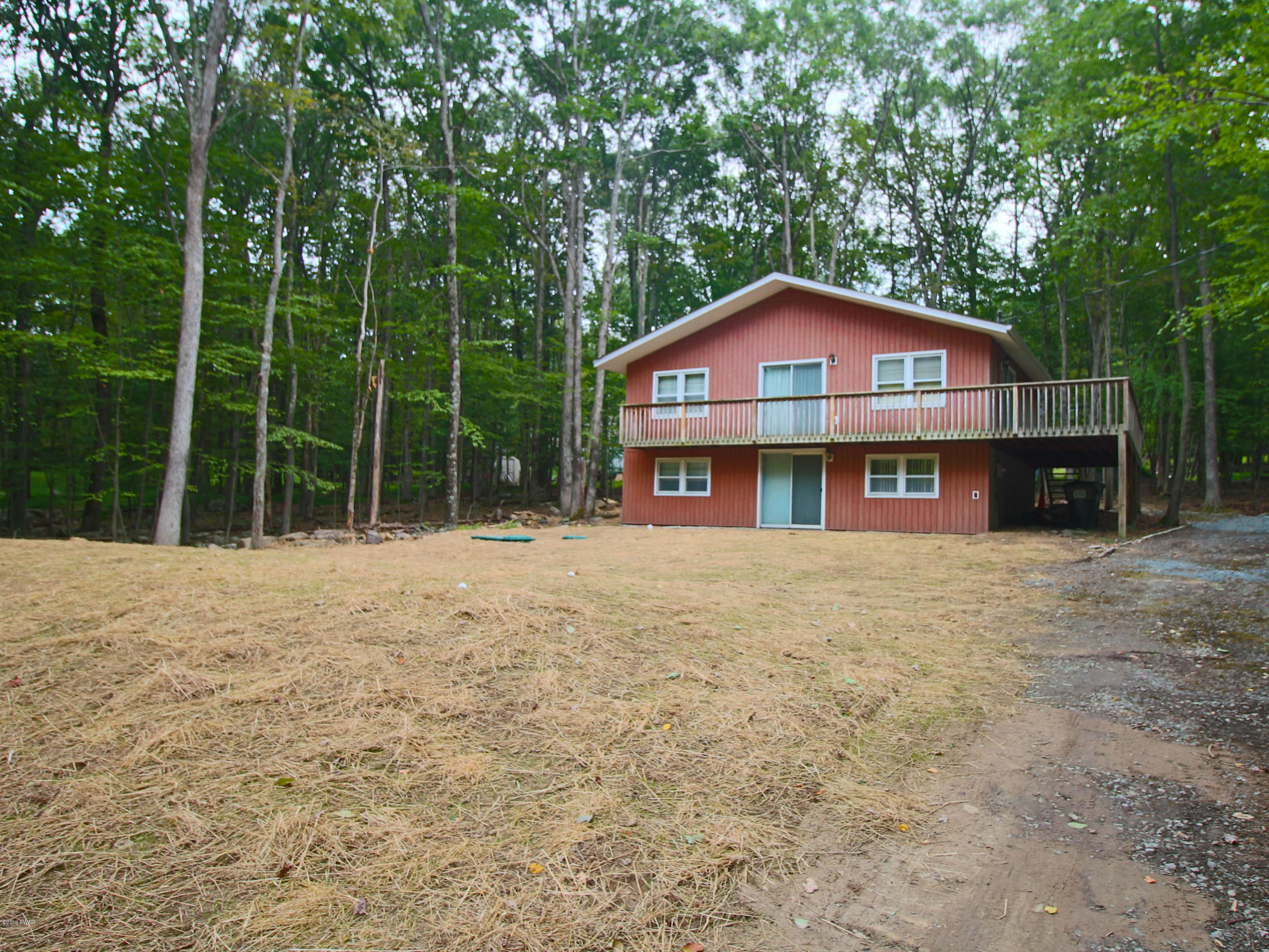 152 Butternut Road Milford, PA 18337 - Photo 1 of 27 a front view of a house with a yard