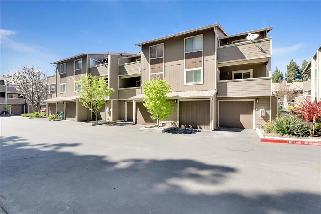 2664 Senter Road, Unit 223 San Jose, CA 95111 - Photo 3 of 11 a front view of a building with a yard