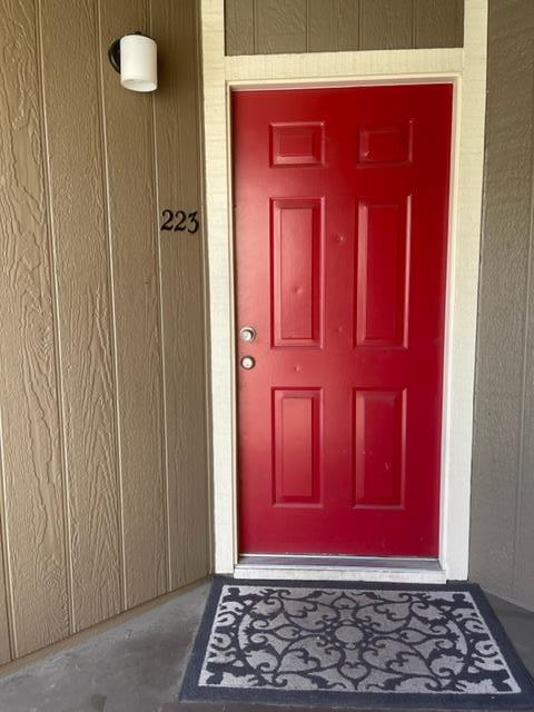 2664 Senter Road, Unit 223 San Jose, CA 95111 - Photo 4 of 11 a view of a red door with a chair
