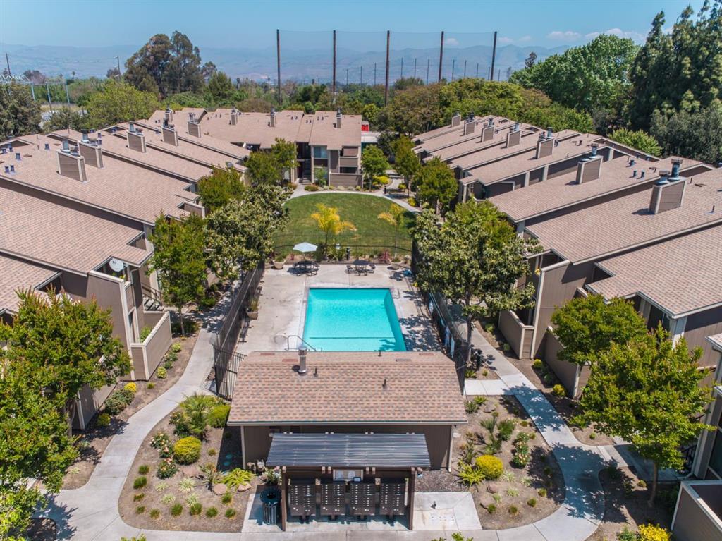 2664 Senter Road, Unit 223 San Jose, CA 95111 - Photo 8 of 11 an aerial view of a house with a garden and lake view