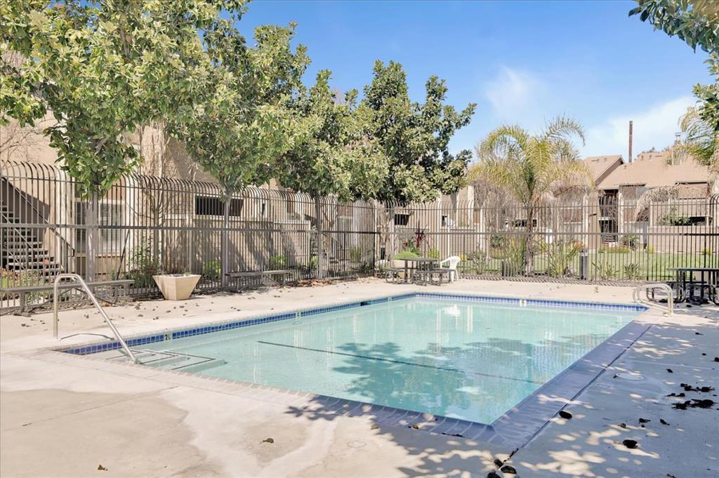 2664 Senter Road, Unit 223 San Jose, CA 95111 - Photo 9 of 11 a view of a swimming pool with a patio