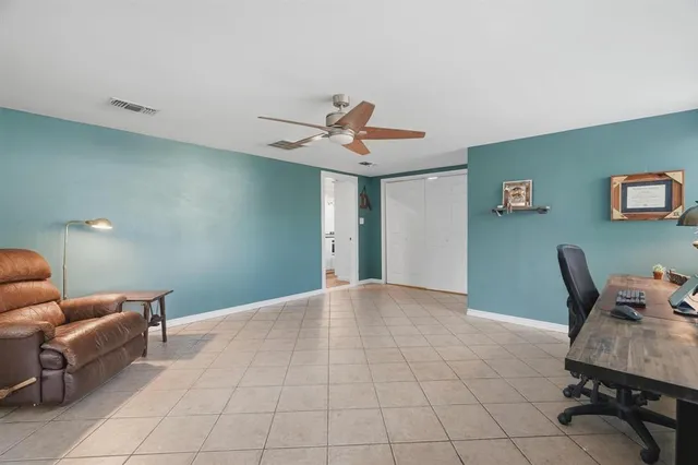 a view of livingroom with furniture and lounge chair