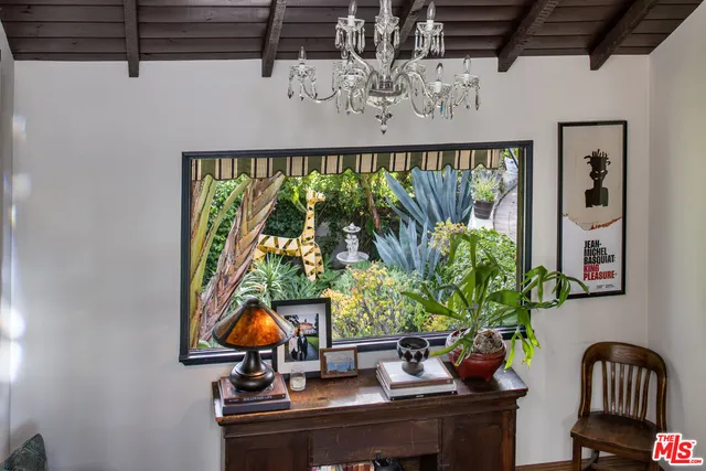 a view of a workspace with furniture