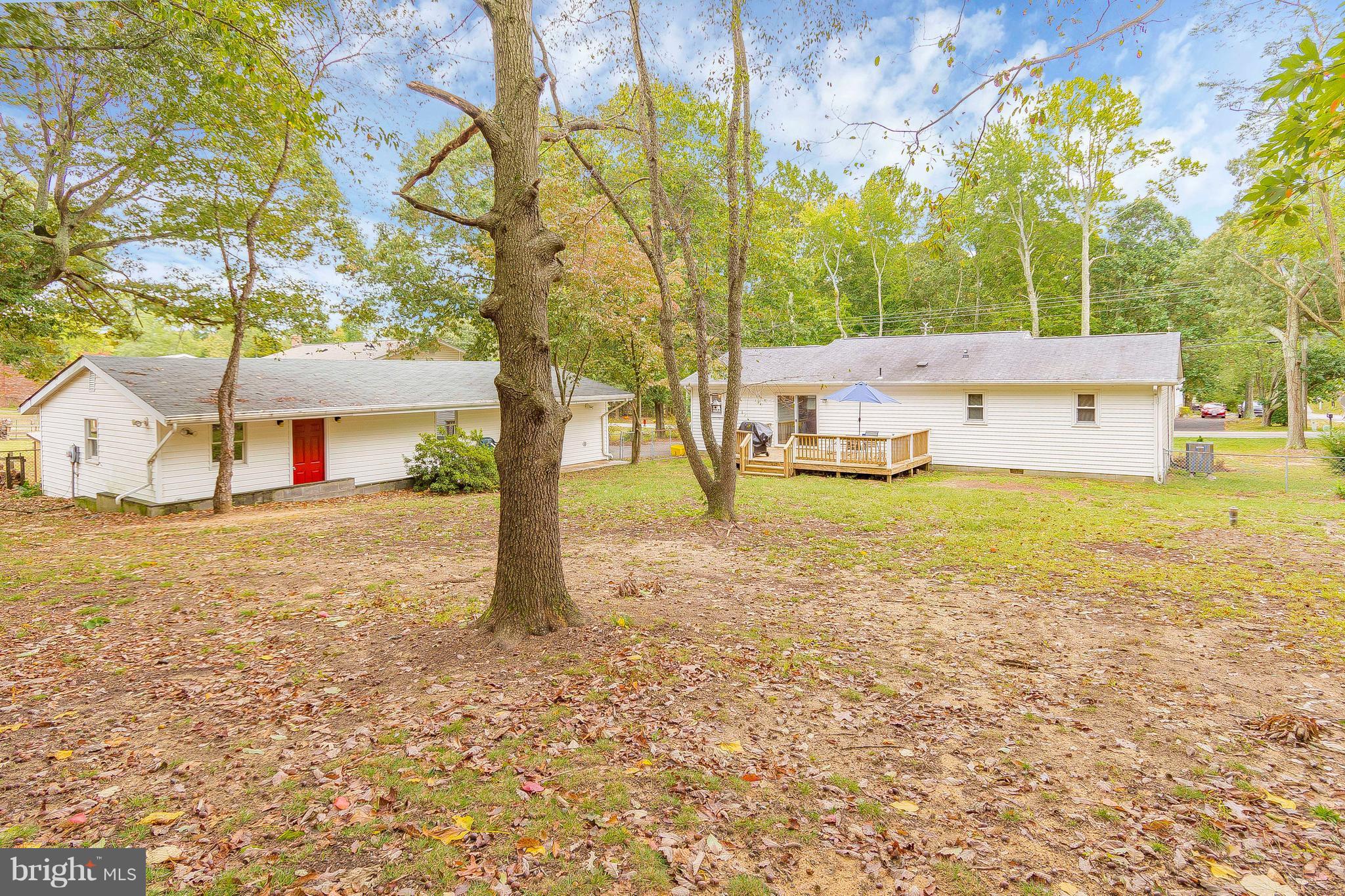 1218 Calvert Beach Road St. Leonard, MD 20685 - Photo 26 of 29 a front view of a house with a yard
