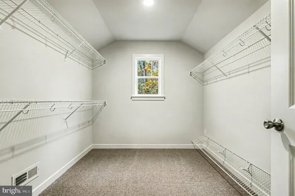 a view of a balcony with wooden floor