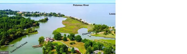 an aerial view of a house with a swimming pool