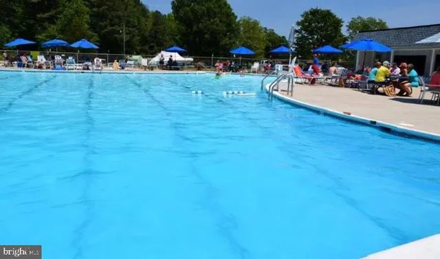 an aerial view of a city and lake view