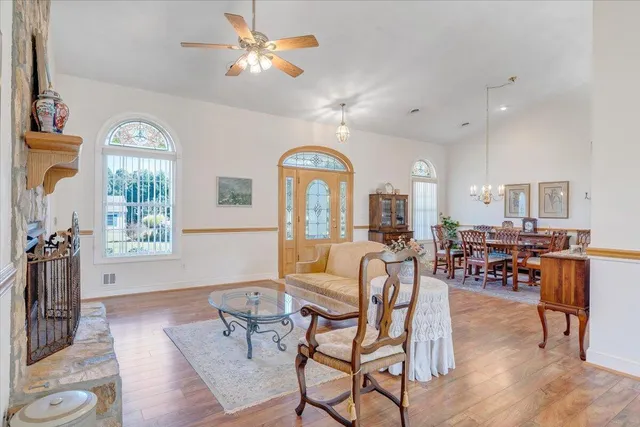 a living room with furniture and a window