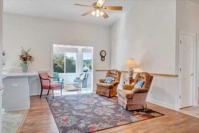 a living room with furniture and a table