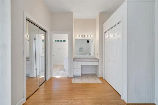 a view of a house with pool and a yard