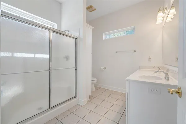 an aerial view of a house with a garden
