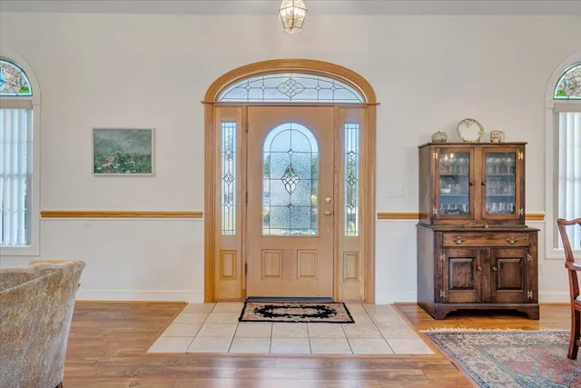 a front view of a house with garden