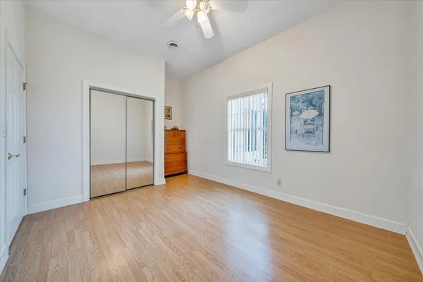 an aerial view of a house with a ocean view