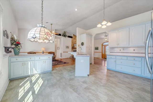 a living room with furniture and a couch