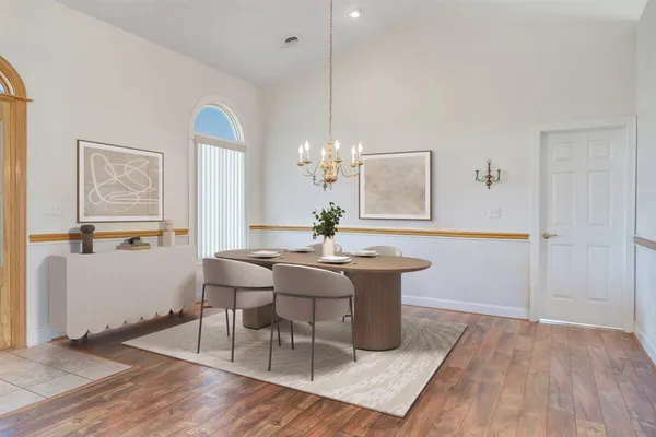 a kitchen with cabinets and stainless steel appliances