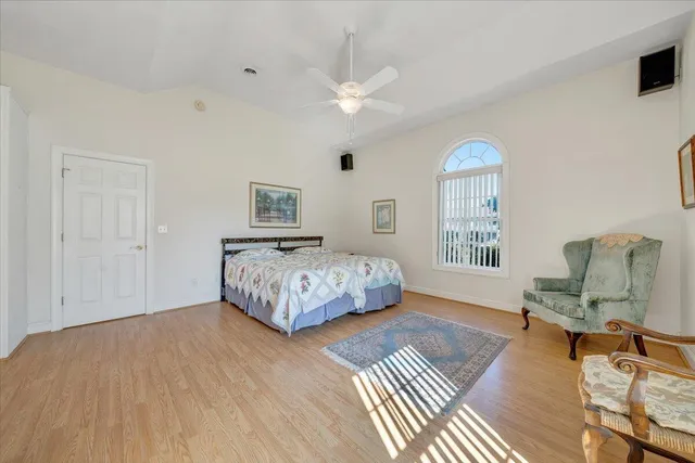 a living room with furniture a rug and a window