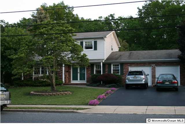 60 Newbury Road Howell, NJ 07731 - Photo 1 of 3 a house view with a garden space