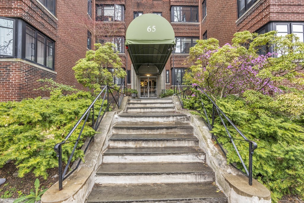 65 Strathmore Road, Unit 21 Boston, MA 02135 - Photo 10 of 10 a front view of a house with a garden