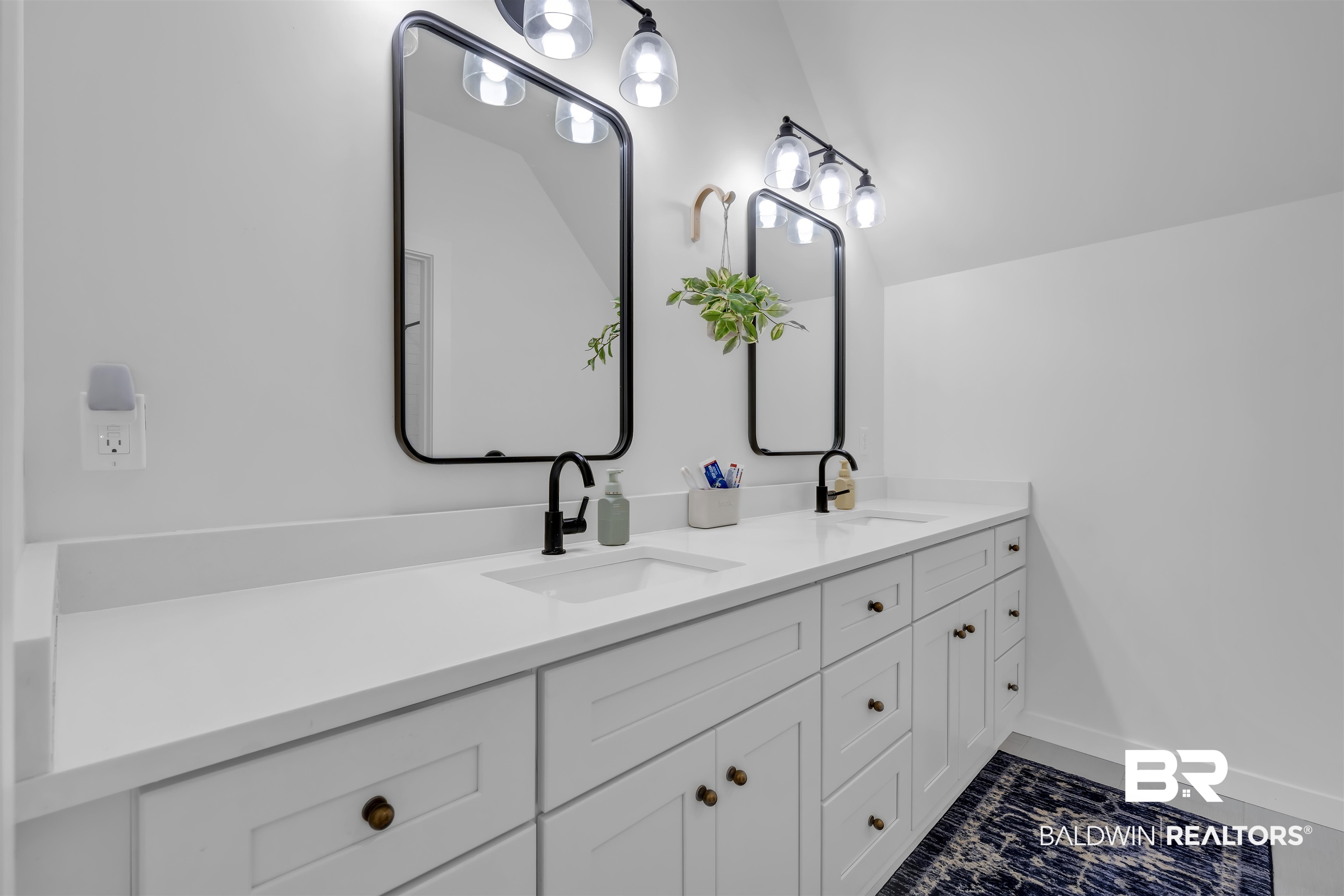 19058 James Road Gulf Shores, AL 36542 - Photo 34 of 49 Full bathroom featuring double vanity and tile patterned flooring