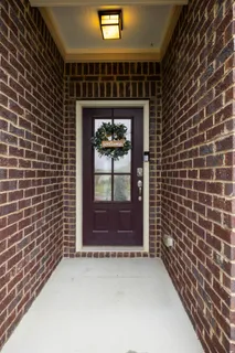 an aerial view of house with yard swimming pool and outdoor seating
