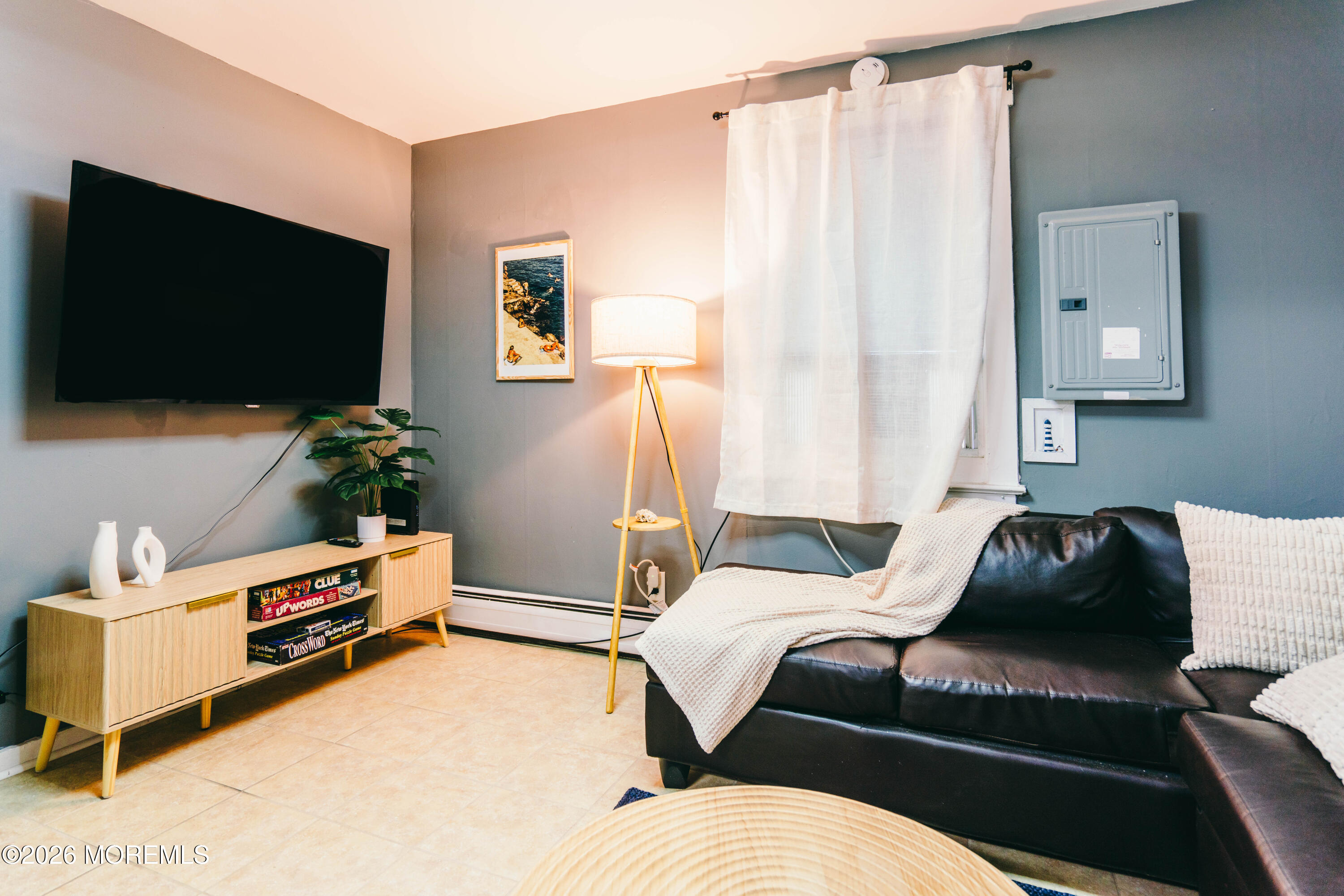 13 Decatur Avenue, Unit C Seaside Park, NJ 08752 - Photo 14 of 35 a bedroom with a bed and flat screen tv