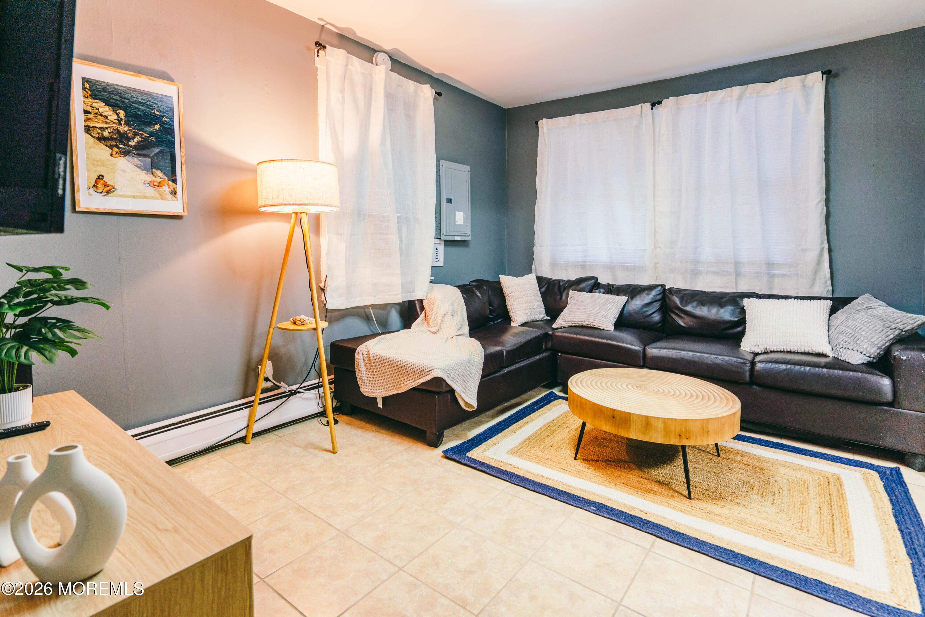 13 Decatur Avenue, Unit C Seaside Park, NJ 08752 - Photo 15 of 35 a living room with furniture and a potted plant