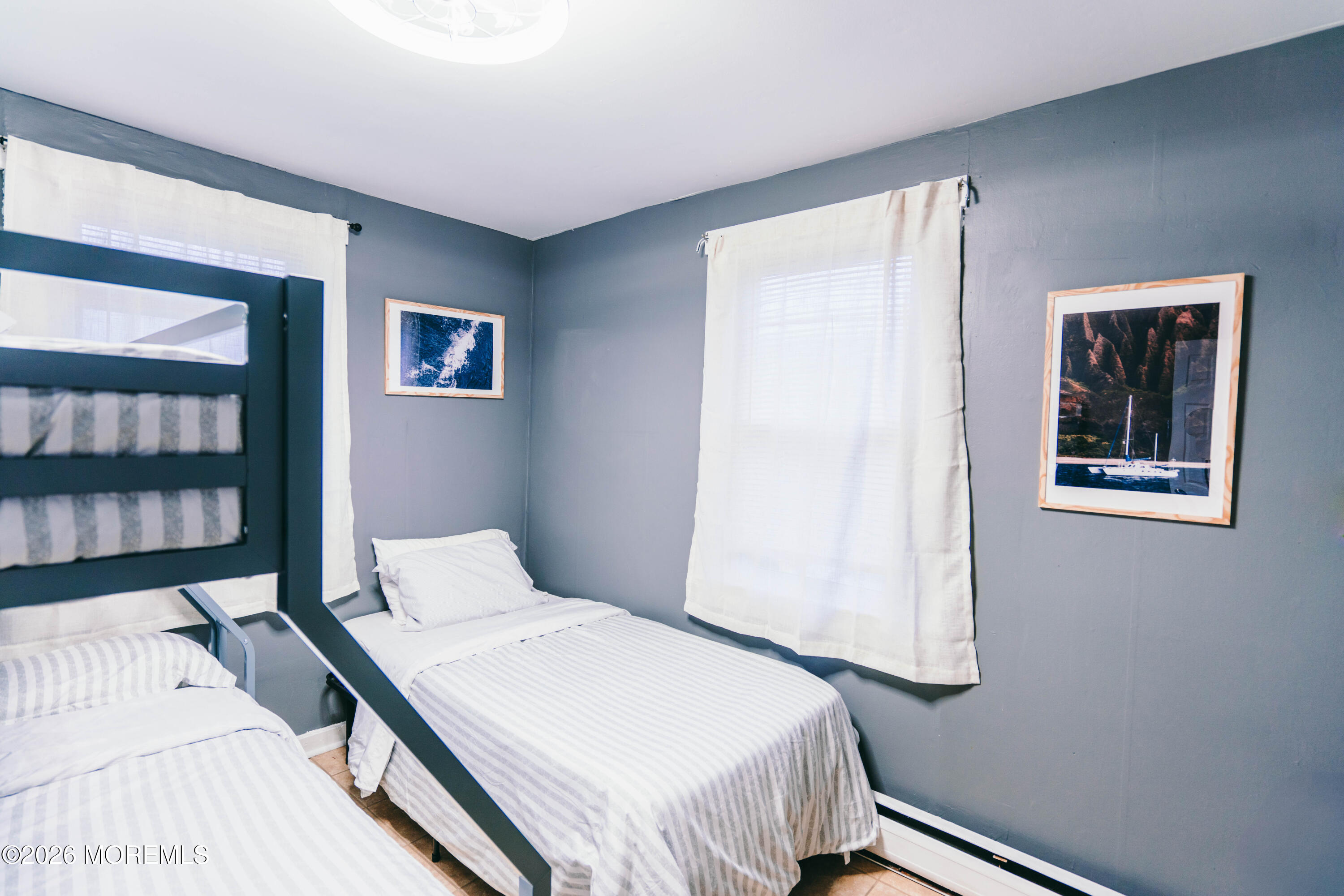 13 Decatur Avenue, Unit C Seaside Park, NJ 08752 - Photo 24 of 35 a bedroom with a bed and a window