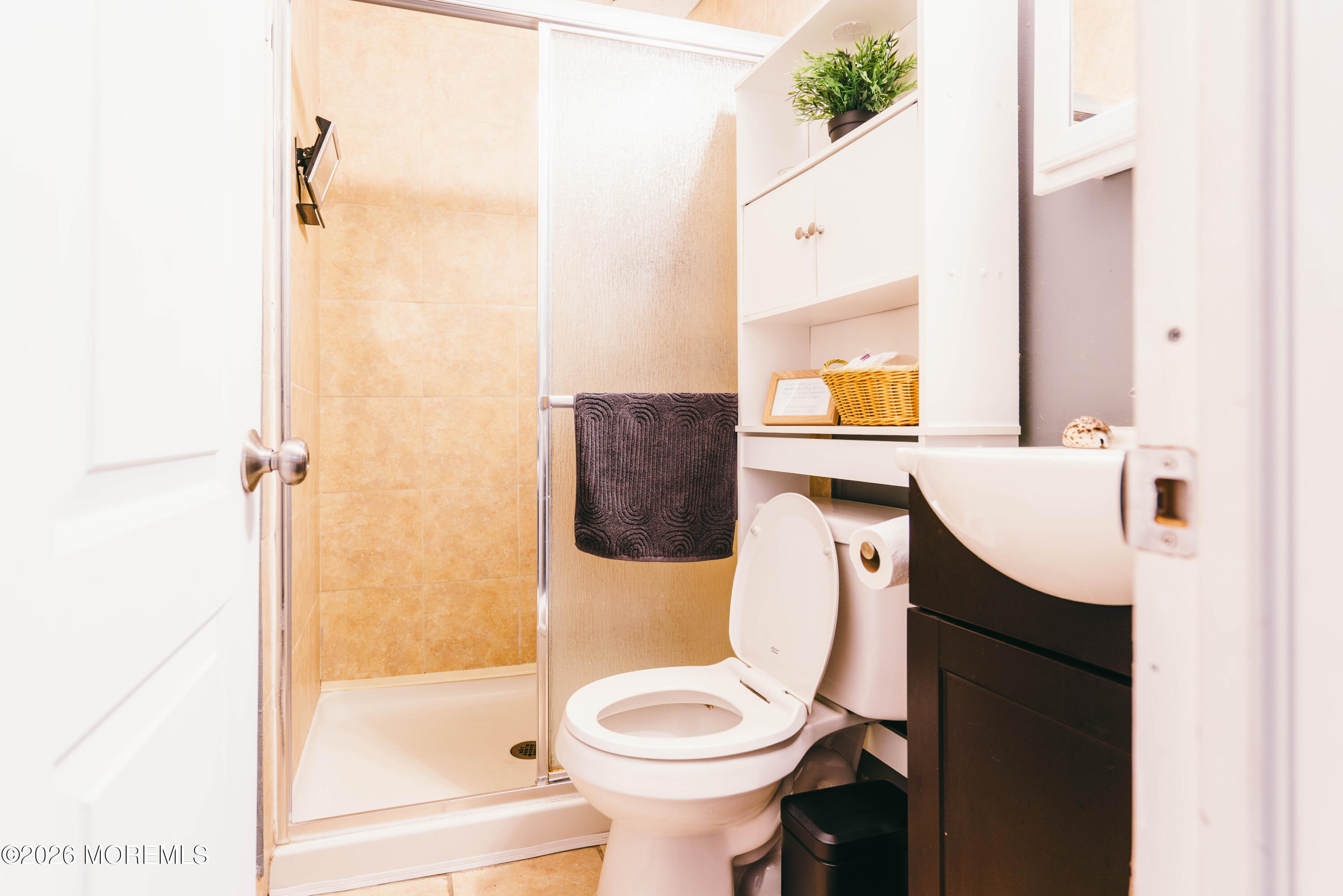 13 Decatur Avenue, Unit C Seaside Park, NJ 08752 - Photo 26 of 35 a bathroom with a sink toilet and shower
