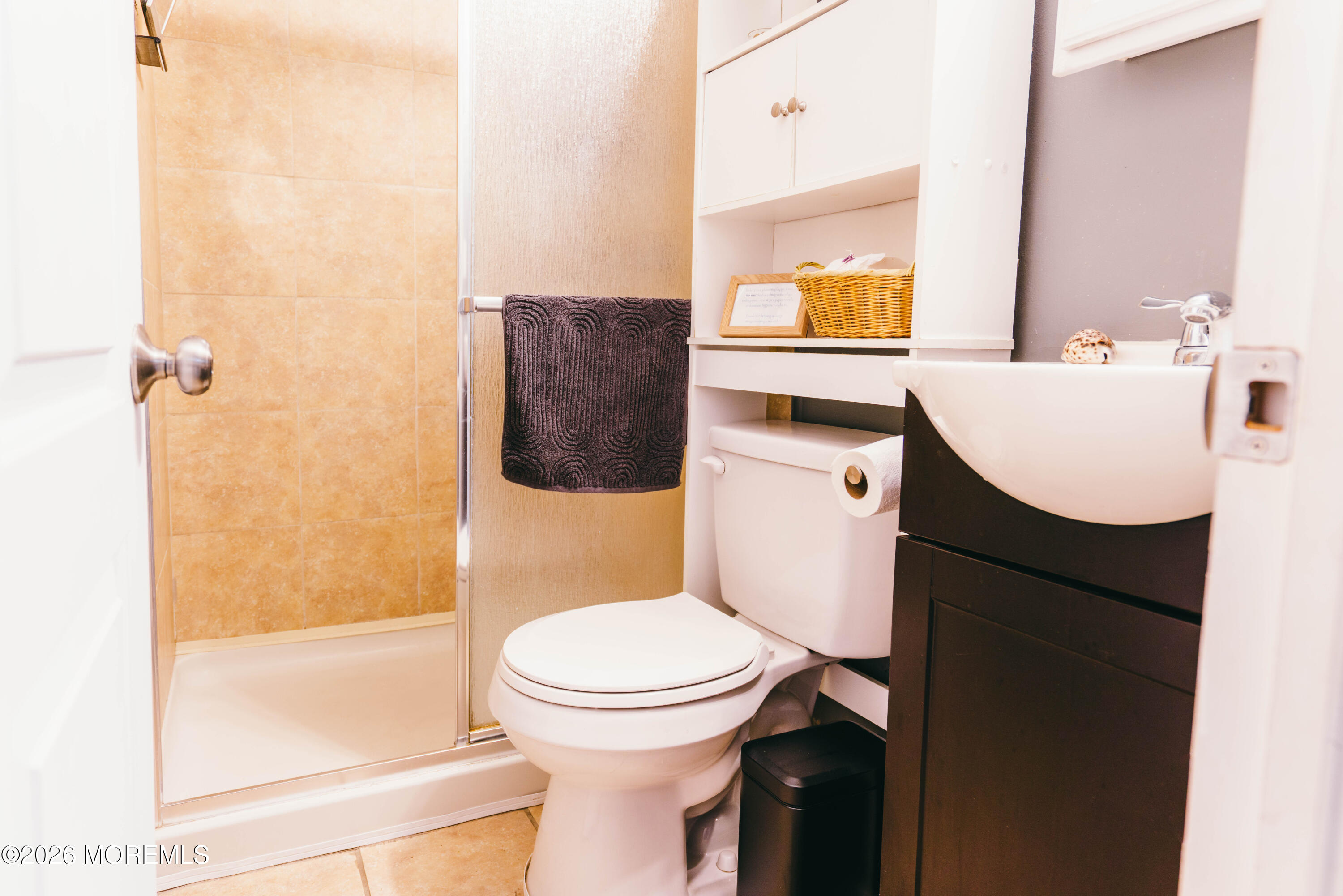 13 Decatur Avenue, Unit C Seaside Park, NJ 08752 - Photo 27 of 35 a bathroom with a sink a toilet and shower