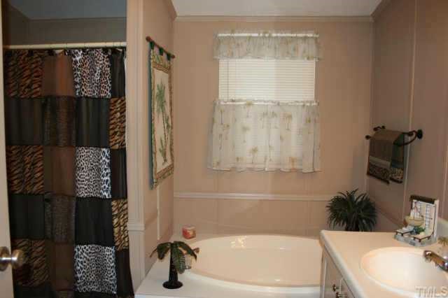 464 Beaver Dam Road Henderson, NC 27537 - Photo 4 of 12 Master bath with garden tub and separate shower