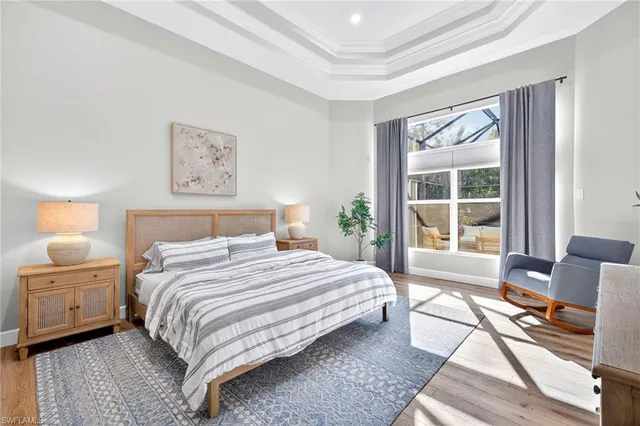 a bedroom with a bed and a desk